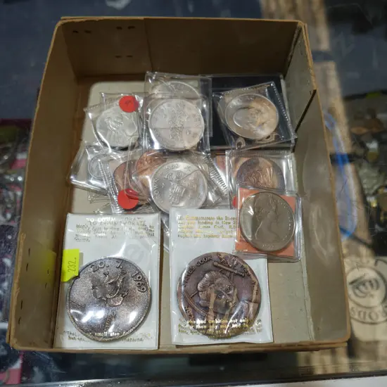 Assorted cased coins