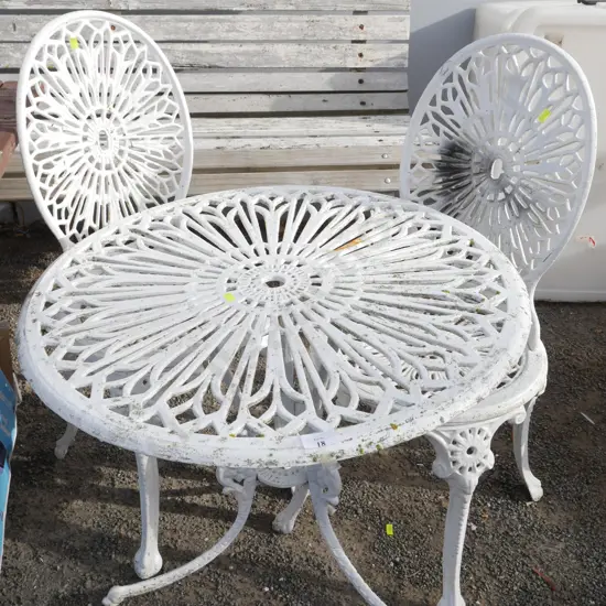 Wrought iron table and 2 chairs