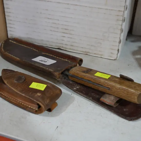 Sheathed knife and pocket knife