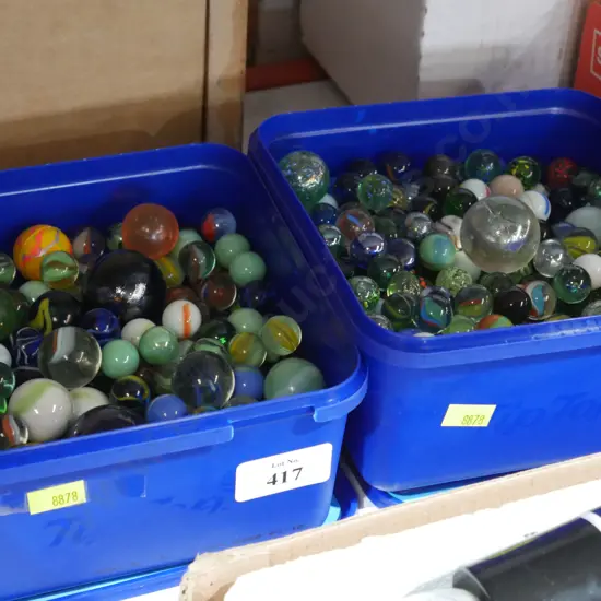 2 containers of marbles