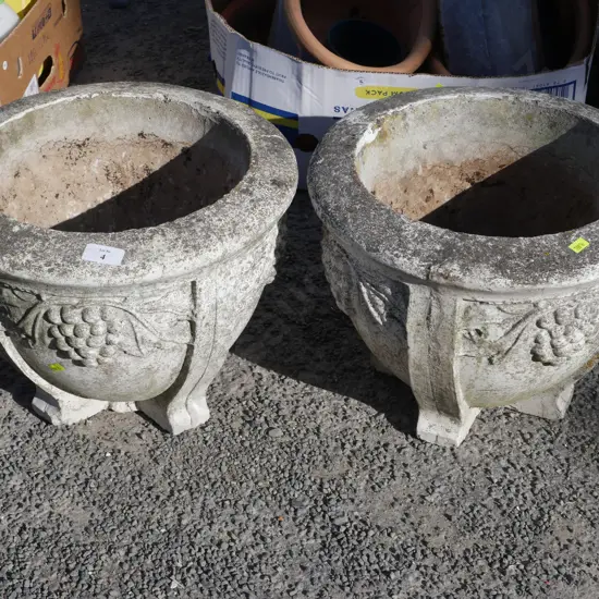 2 concrete plant pots