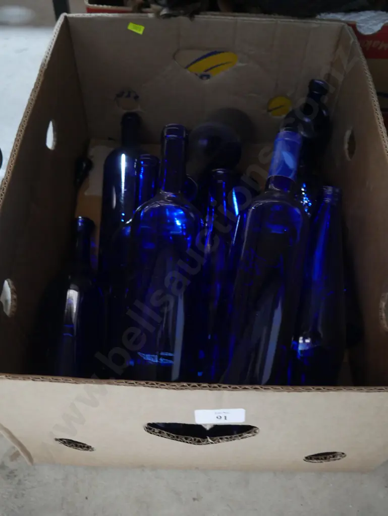 Blue glass bottles Image 1++