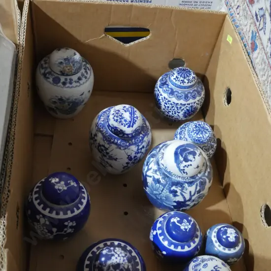 Assorted blue and white ginger jars
