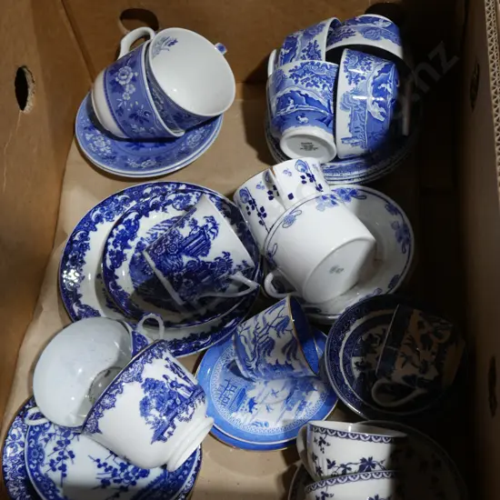 Blue and white cups and sauces