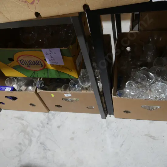 Four boxes of glassware