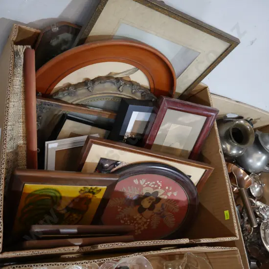 Assorted artworks, frames