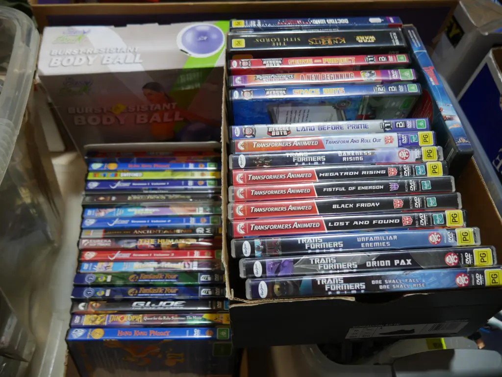 2 boxes DVDs, body ball Image 1++