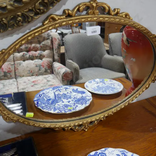 Oval gilt frame wall mirror