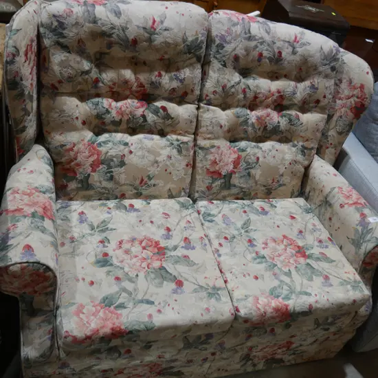 Floral 2-seater wing back sofa