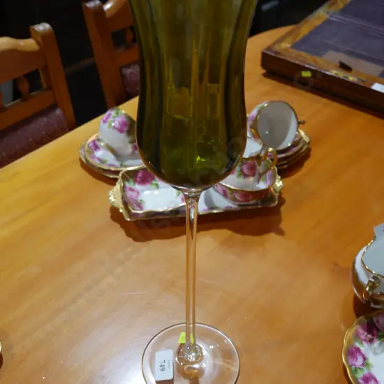 Tall green glass stemmed goblet