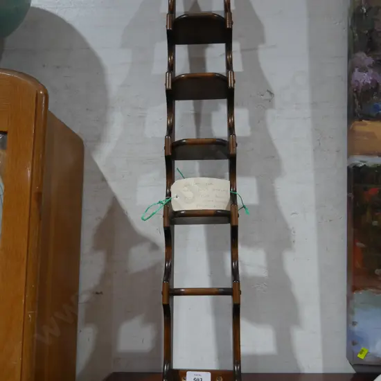 Wooden stand for Toby jugs