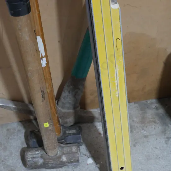 Sledge hammers , pick , levels