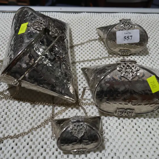 4 metal purses