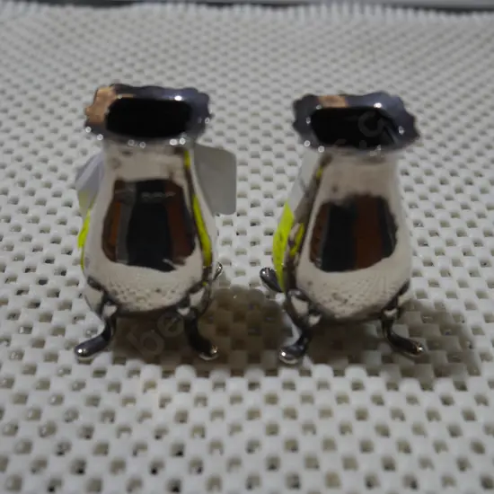 Sterling silver pepper pots