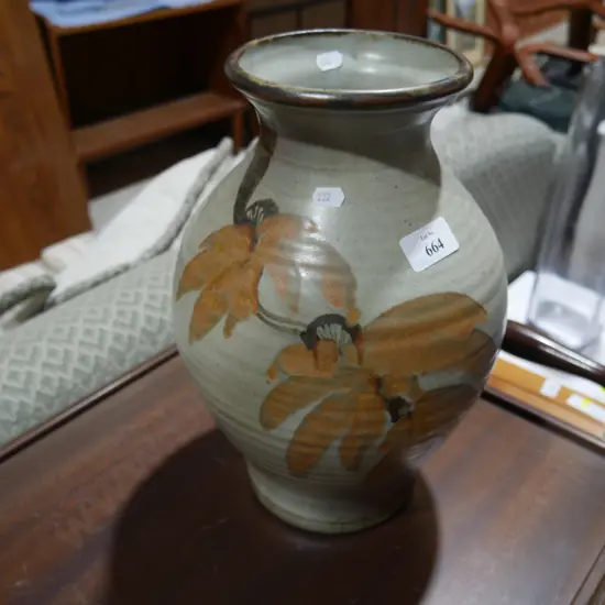 Pottery jar. R McClashen