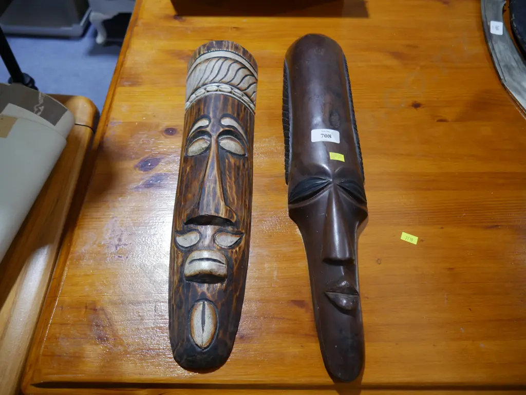 2 tribal faces Image 1++