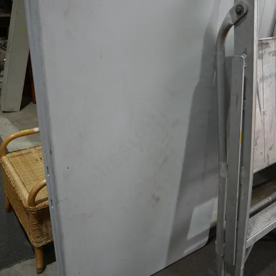 Folding trestle table