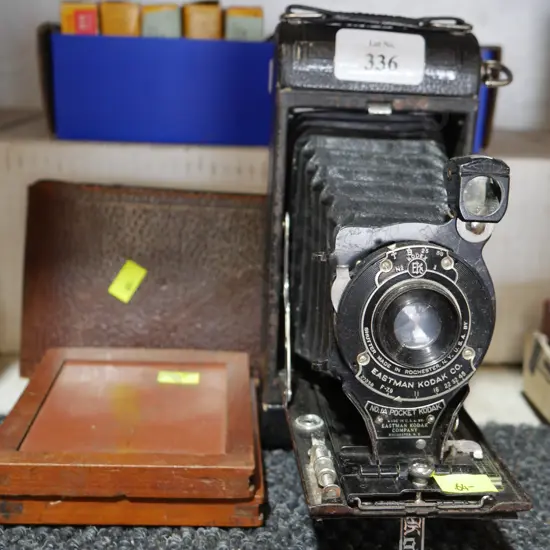 Vintage folding camera, in case
