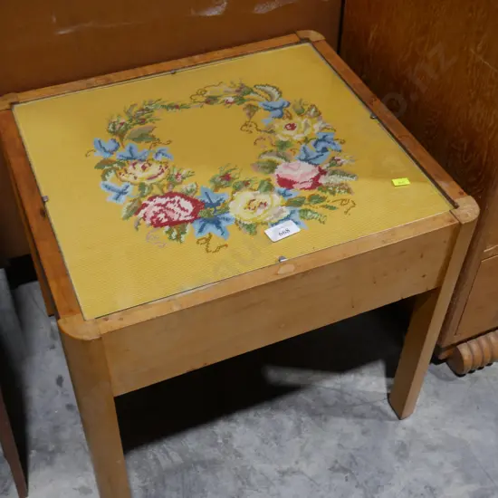 Table with tapestry top