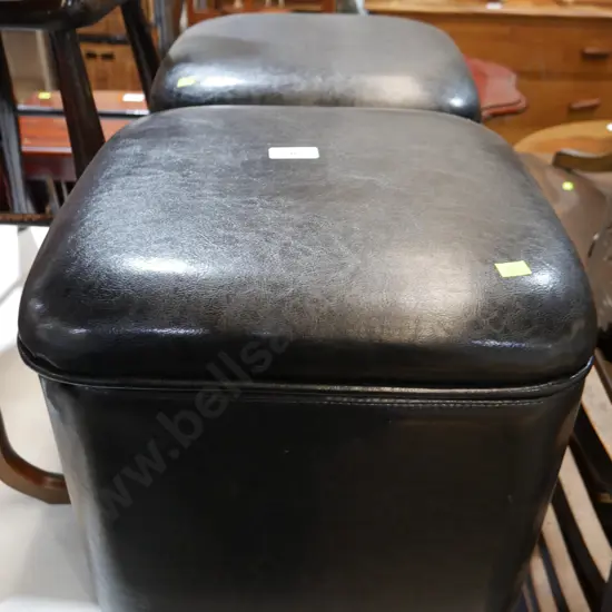 2 black storage boxes