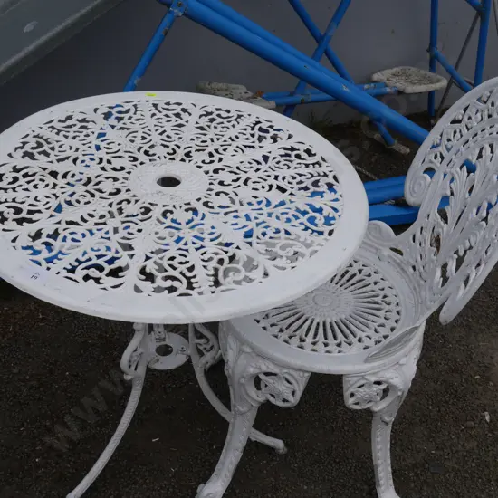 White metal outdoor table and one chair