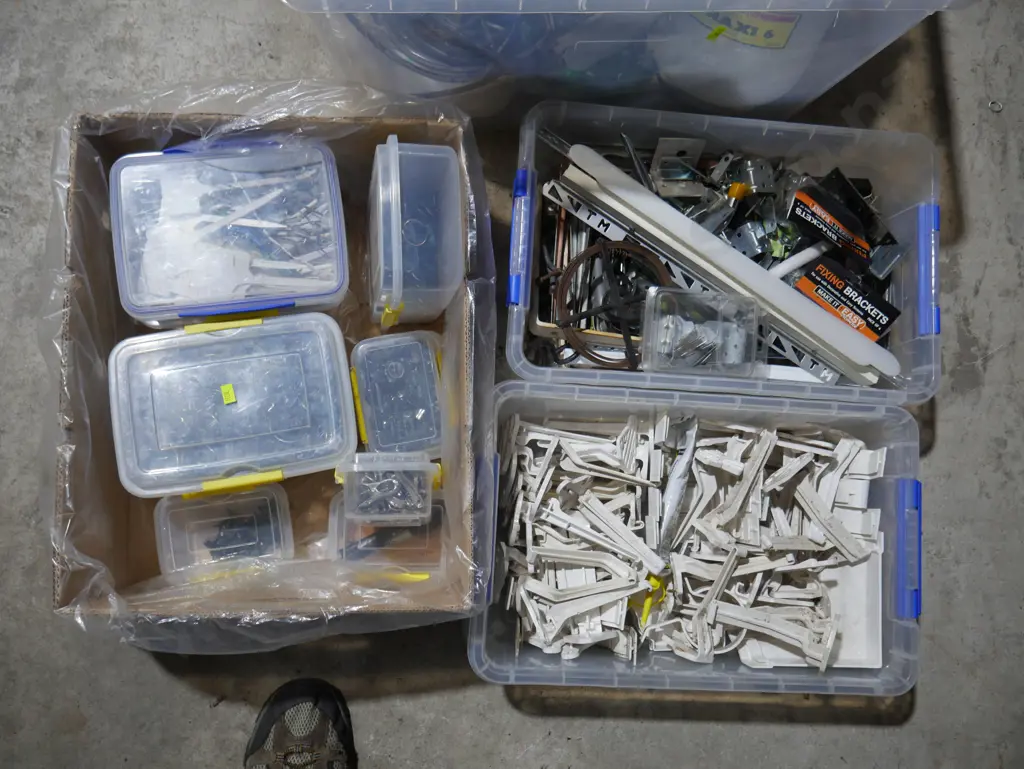 7 boxes/containers of brackets, garden sprayers etc Image 1++