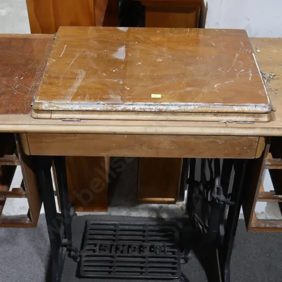 Singer sewing machine base