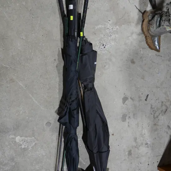 Umbrellas, golf clubs