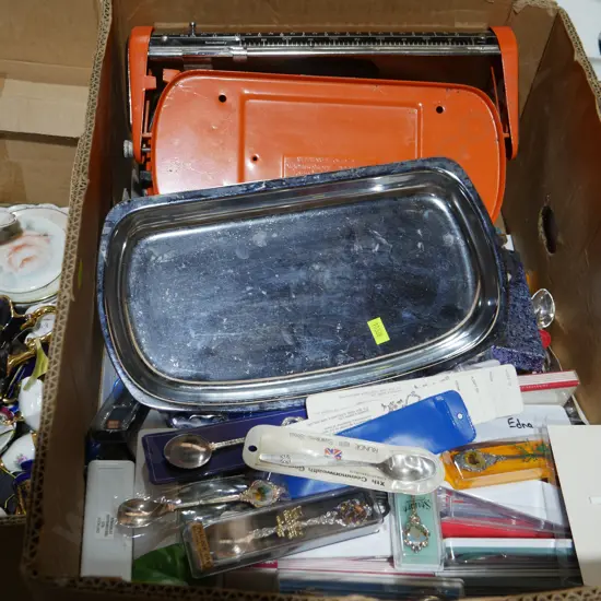 Scales and souvenir teaspoons