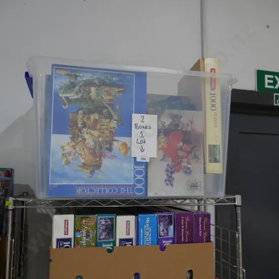 Two boxes of jigsaw puzzles