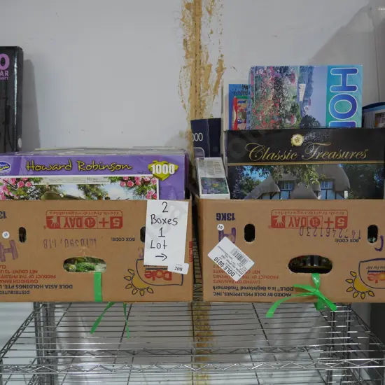 Two boxes of jigsaw puzzles