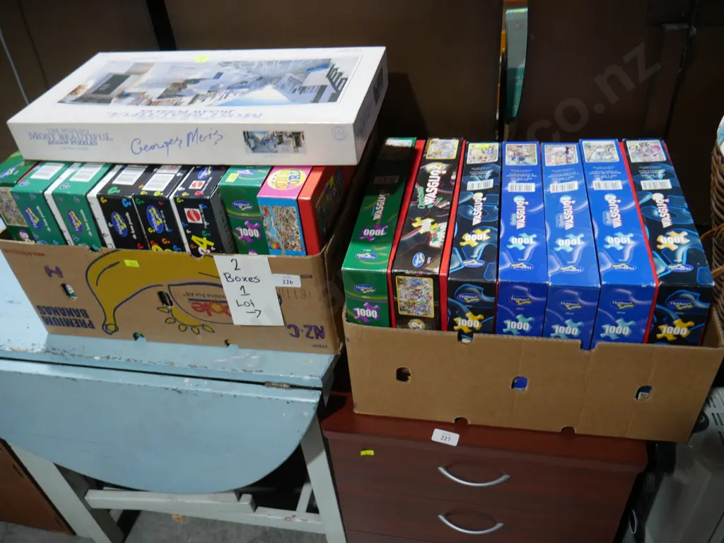 Two boxes of jigsaw puzzles Image 1++