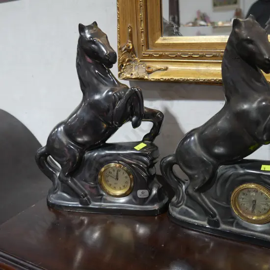 Two horse clocks