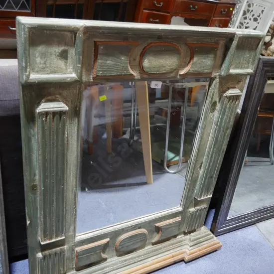 Ornate framed mirror