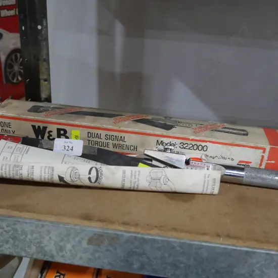 Dual signal torque wrench