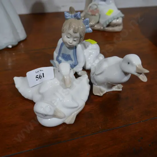 Nao duck and girl figurines