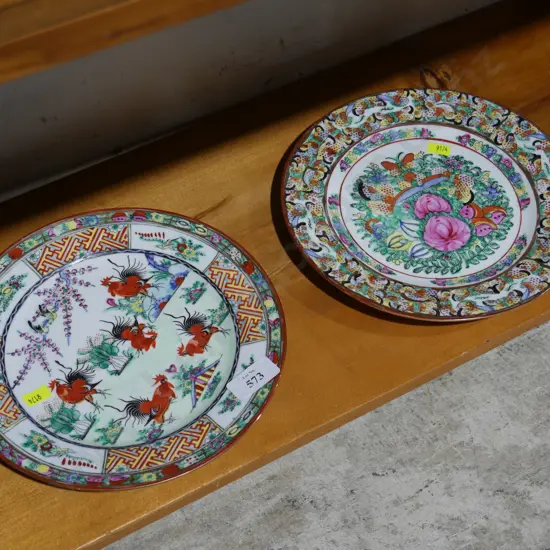 2 Oriental cabinet plates