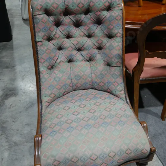 Deep buttoned easy chair