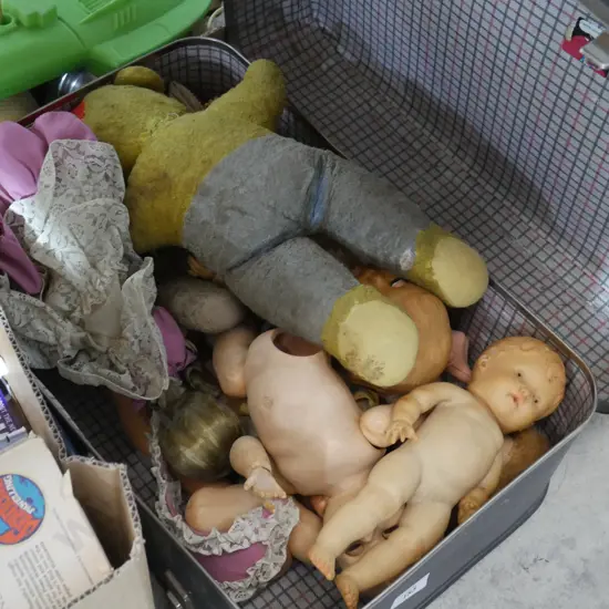 Suitcase of scary dolls
