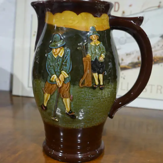 Royal Doulton Kingsware golfers jug (repaired)