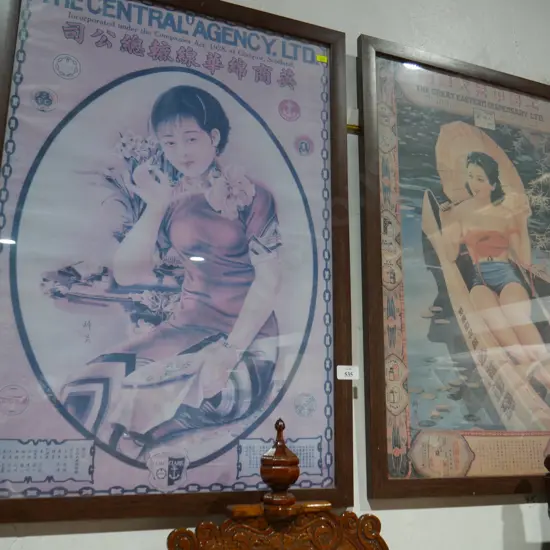2 framed Oriental advertising prints