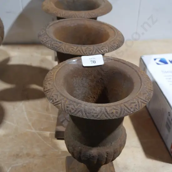 4 cast iron planters