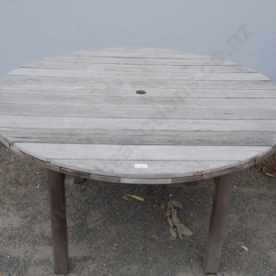 Round wooden outdoor table