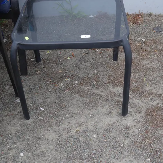 Glass top outdoor coffee table