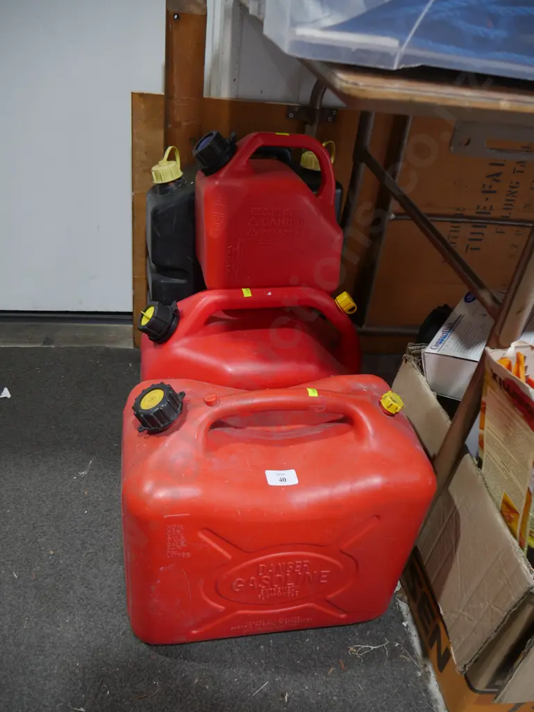 4 petrol cans Image 1++
