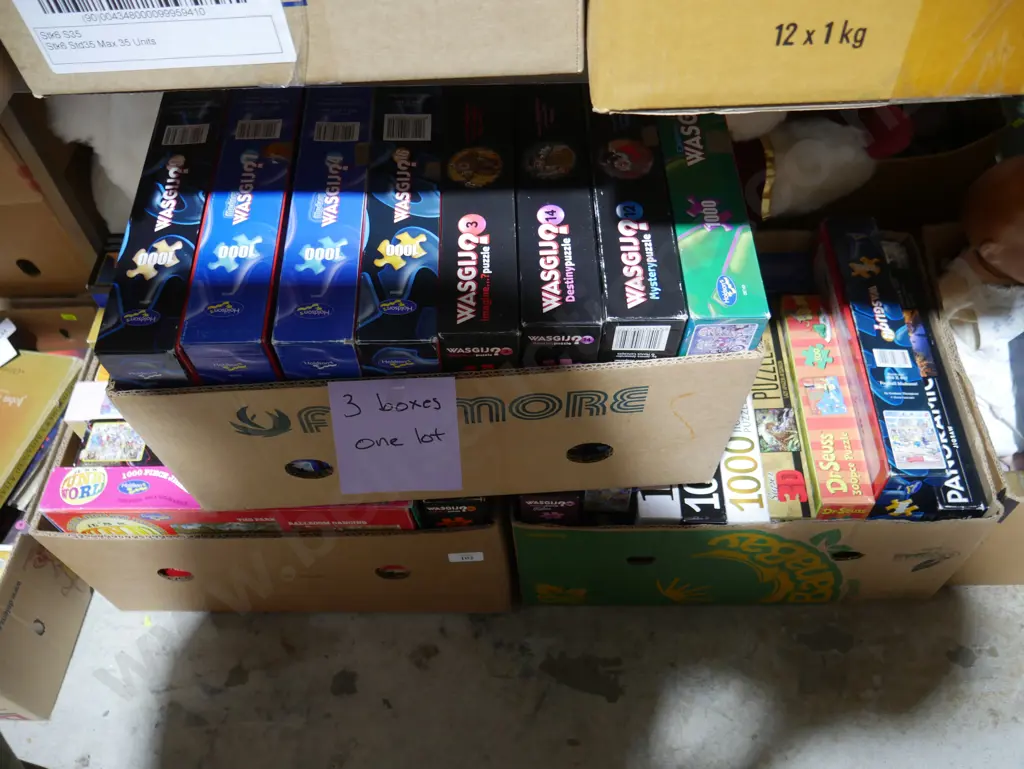 Three boxes of jigsaw puzzles Image 1++