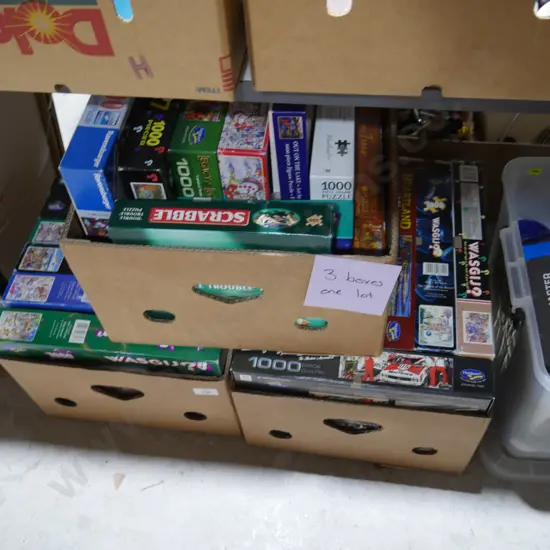 3 boxes of jigsaw puzzles