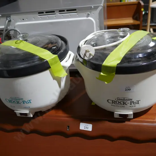 Two sunbeam crock pots