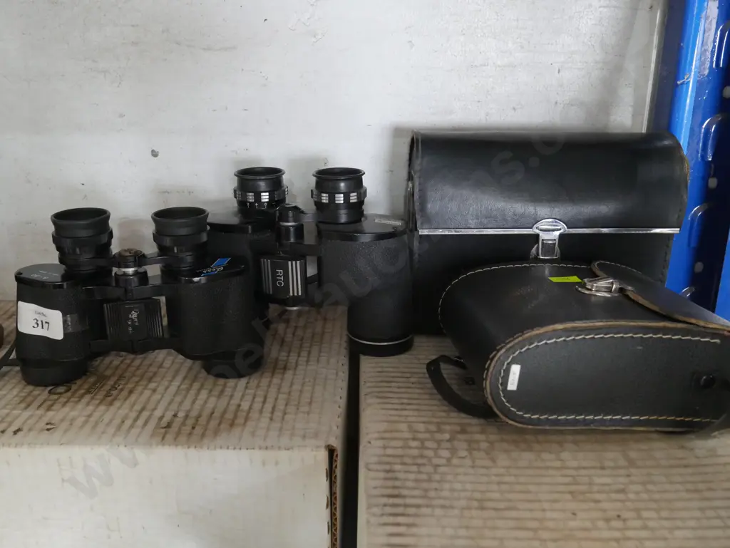2 binoculars and cases Image 1++