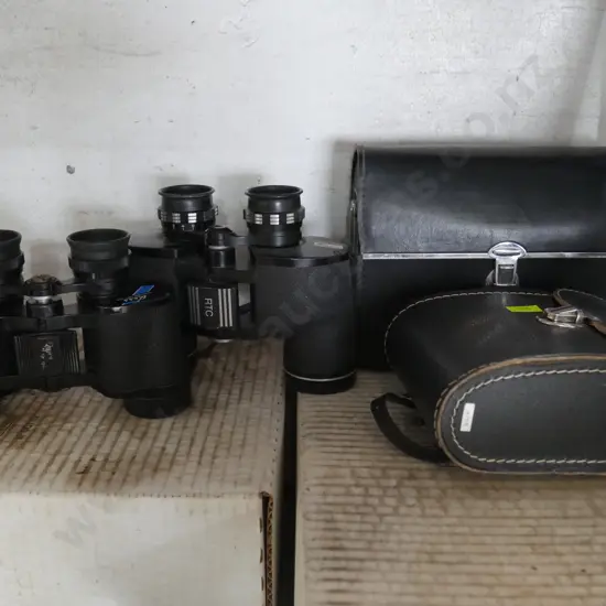 2 binoculars and cases